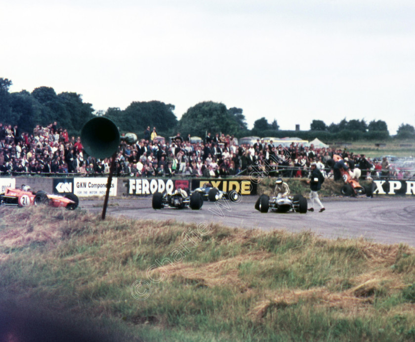 19690719-100 
 F3 grief at Club corner L-r W Reidel McNamara ? ? ? H. Marko McNamara 
 Keywords: Reidel Marko McNamara Silverstone